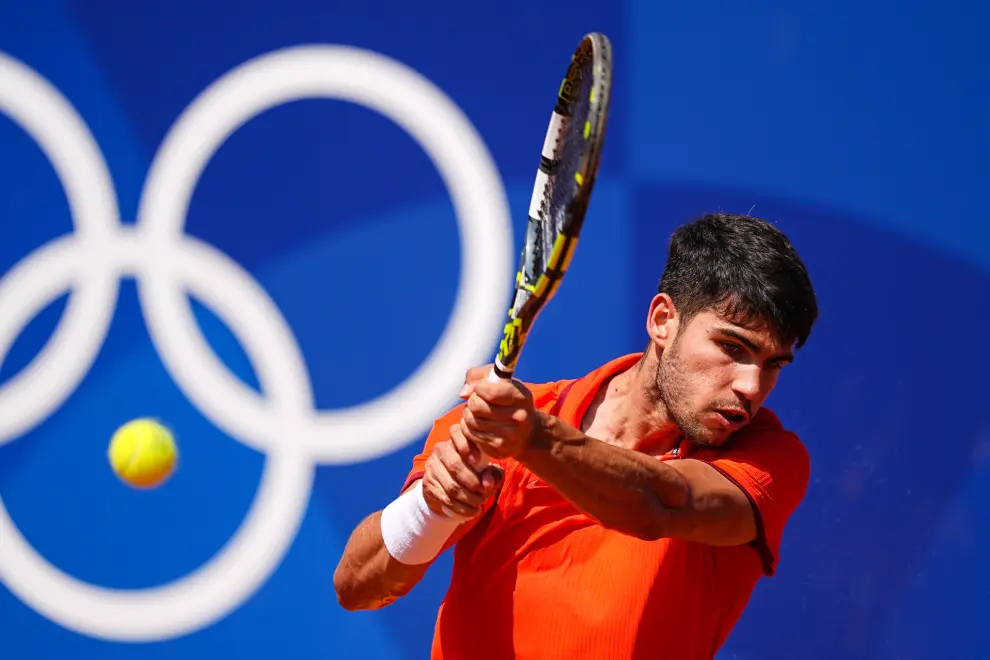 Carlos Alcaraz of Spain in action against Roman Safiullin of Individual Neutral Athlete during Mens Singles Third Round Tennis match on Court Suzanne-Lenglen during the Paris 2024 Olympics Games on July 31, 2024 in Paris, France...AFP7 ..31/07/2024 ONLY FOR USE IN SPAIN [[[EP]]]