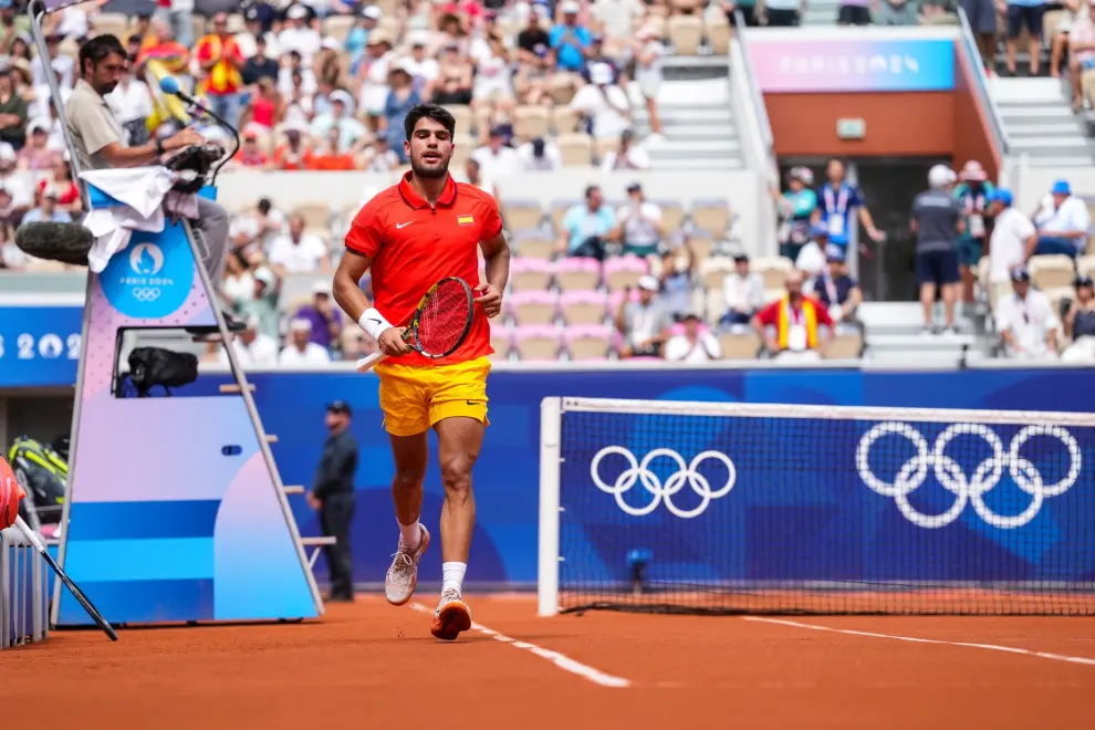 Carlos Alcaraz of Spain gestures against Roman Safiullin of Individual Neutral Athlete during Mens Singles Third Round Tennis match on Court Suzanne-Lenglen during the Paris 2024 Olympics Games on July 31, 2024 in Paris, France...AFP7 ..31/07/2024 ONLY FOR USE IN SPAIN [[[EP]]]