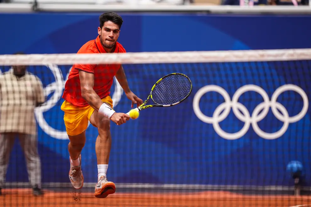 Carlos Alcaraz of Spain in action against Roman Safiullin of Individual Neutral Athlete during Mens Singles Third Round Tennis match on Court Suzanne-Lenglen during the Paris 2024 Olympics Games on July 31, 2024 in Paris, France...AFP7 ..31/07/2024 ONLY FOR USE IN SPAIN [[[EP]]]