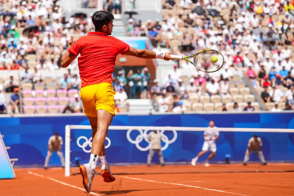 Carlos Alcaraz of Spain in action against Roman Safiullin of Team Individual Neutral Athletes during the Mens Singles Third Round at Roland Garros during the 2024 Paris Summer Olympic Games in Paris on July 31, 2024 in Paris, France. France...AFP7 ..31/07/2024 ONLY FOR USE IN SPAIN [[[EP]]]