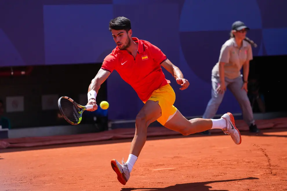 Carlos Alcaraz of Spain in action against Roman Safiullin of Individual Neutral Athlete during Mens Singles Third Round Tennis match on Court Suzanne-Lenglen during the Paris 2024 Olympics Games on July 31, 2024 in Paris, France...AFP7 ..31/07/2024 ONLY FOR USE IN SPAIN [[[EP]]]