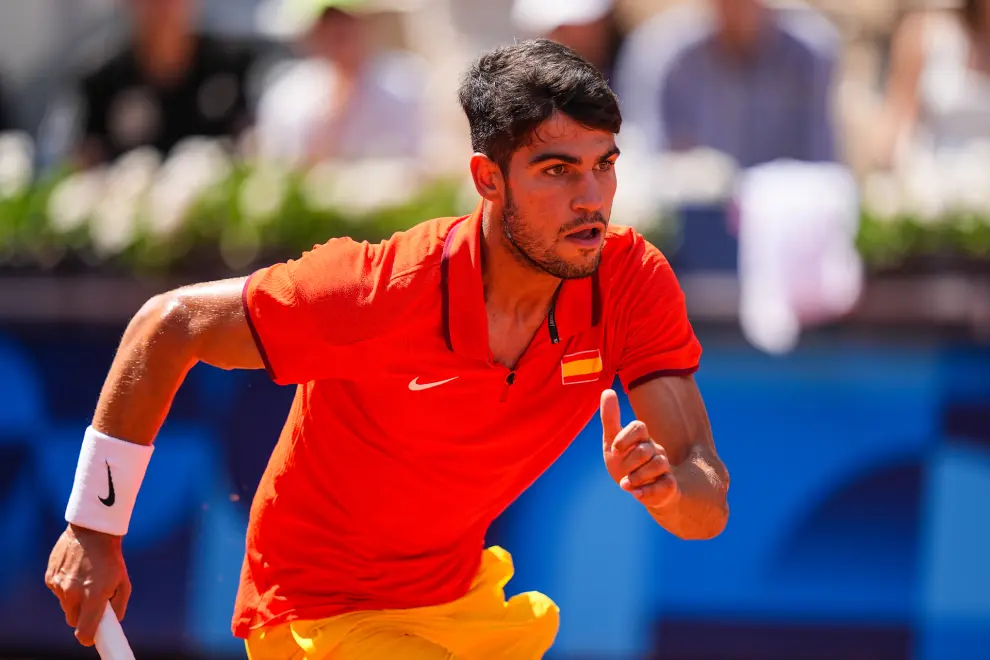 Carlos Alcaraz of Spain in action against Roman Safiullin of Individual Neutral Athlete during Mens Singles Third Round Tennis match on Court Suzanne-Lenglen during the Paris 2024 Olympics Games on July 31, 2024 in Paris, France...AFP7 ..31/07/2024 ONLY FOR USE IN SPAIN [[[EP]]]