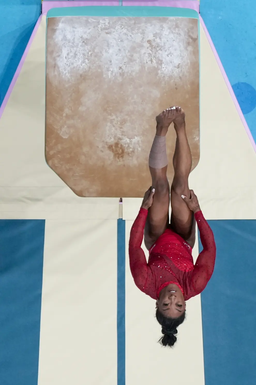 Simone Biles, of the United States, performs on the vault during the women's artistic gymnastics individual vault finals in Bercy Arena at the 2024 Summer Olympics, Saturday, Aug. 3, 2024, in Paris, France. (AP Photo/Morry Gash)