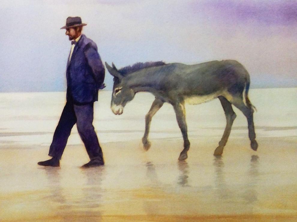 Juan Ramón Jiménez y su burro Platero en la playa.