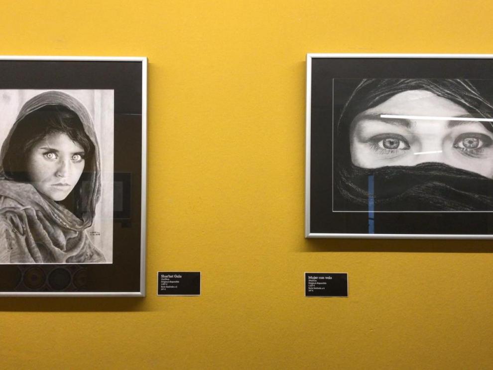 Dos de los dibujos de Albert Lluís expuestos en Impact Hub Zaragoza.
