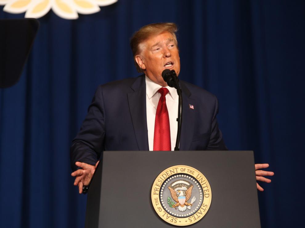 Louisville (United States), 21/08/2019.- US President Donald J. Trump speaks to the audience at the American Veterans of Foreign Wars National Convention at the Galt House in Louisville, KY, USA, 21 August 2019. (Estados Unidos) EFE/EPA/MARK LYONS Trump speaks at Anerican Veterans National Convention