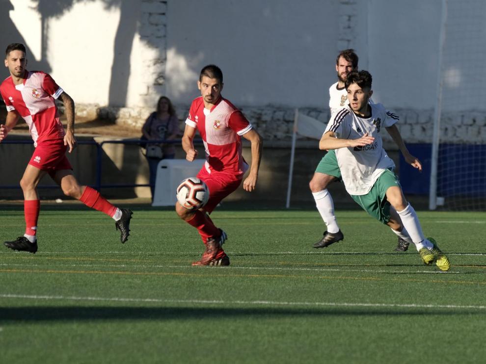 Un lance del partido entre el Peñas Oscenses ante el Actur Pablo Iglesias