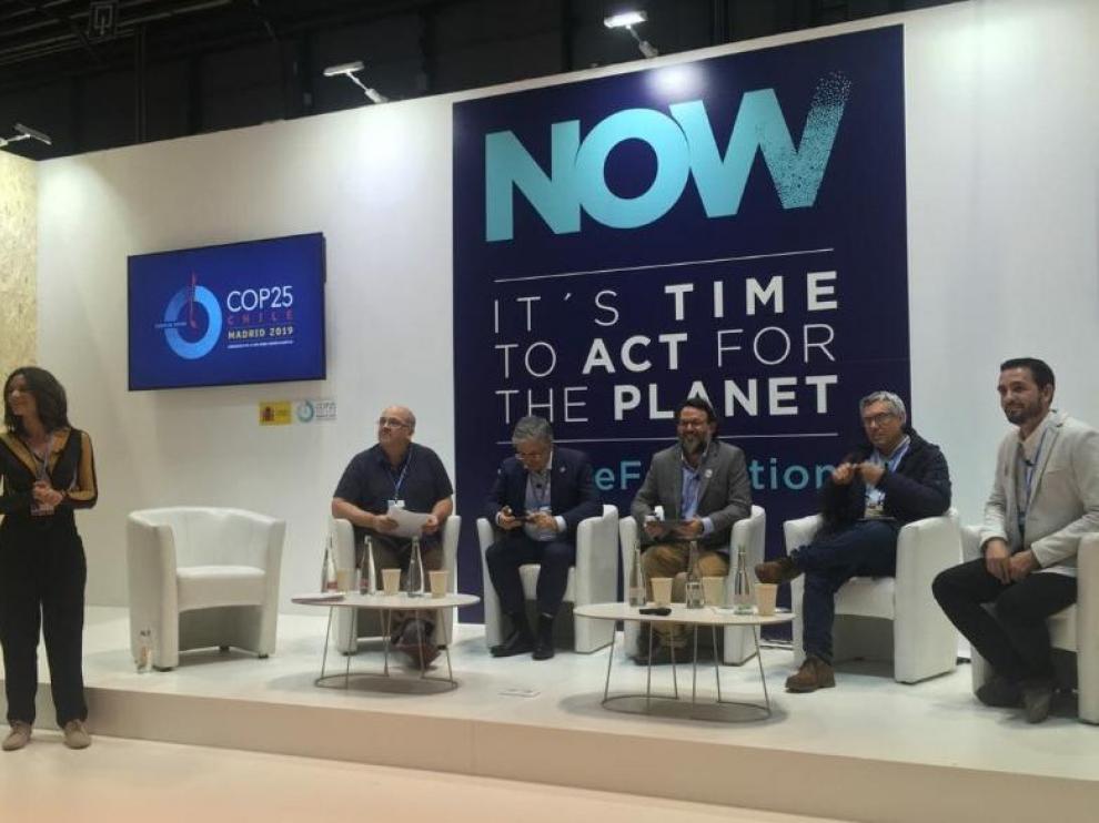 Toboso, a la izquierda, en un momento de la mesa redonda que se ha celebrado este lunes en Ifema.