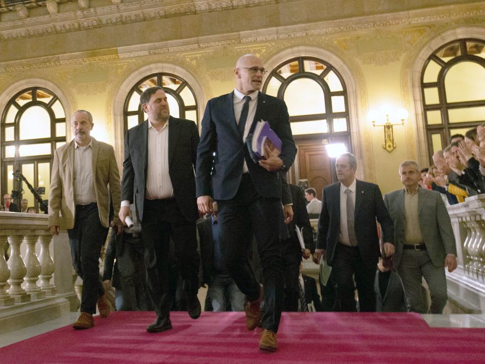Los exconsejeros presos, en el Parlament