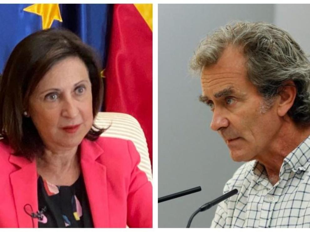 En la imagen, la ministra Margarita Robles (i), y el director del Centro Nacional de Alertas y Emergencias Sanitarias, Fernando Simón (d).