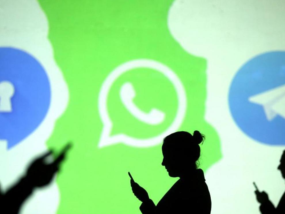 Los logos de Signal, WhatsApp y Telegram