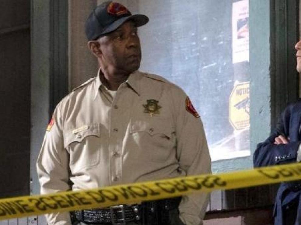 Denzel Washington y Rami Malek, en 'Pequeños detalles'.