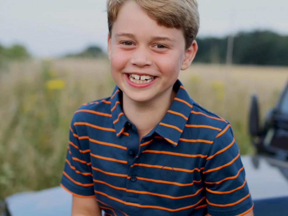 Britain's Prince George poses ahead of his eighth birthday