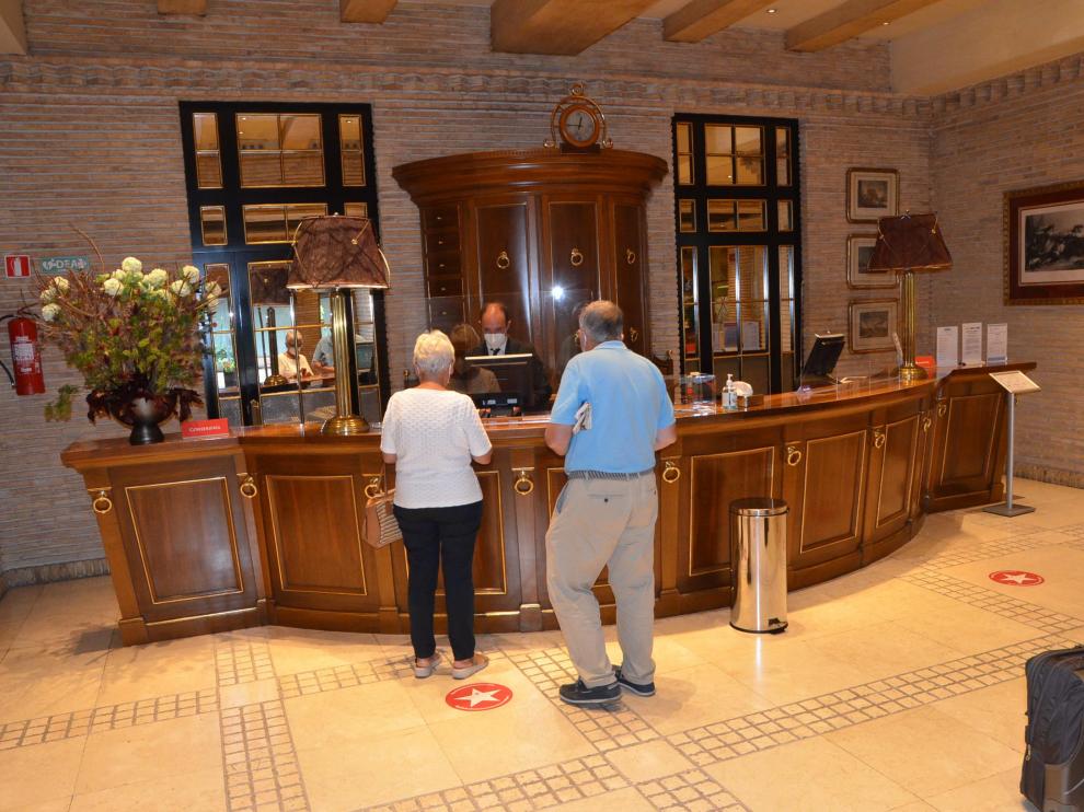 En la recepción del hotel Palafox se ha incrementado la actividad en las últimas semanas.