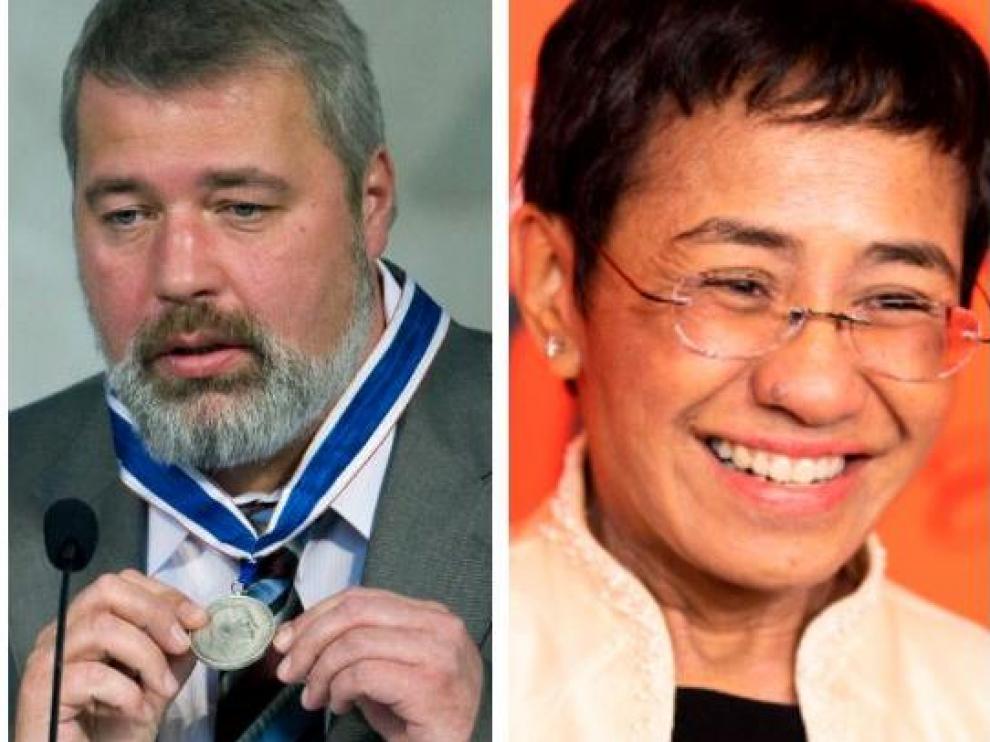 Los periodistas Dmitry Muratov y Maria Ressa.