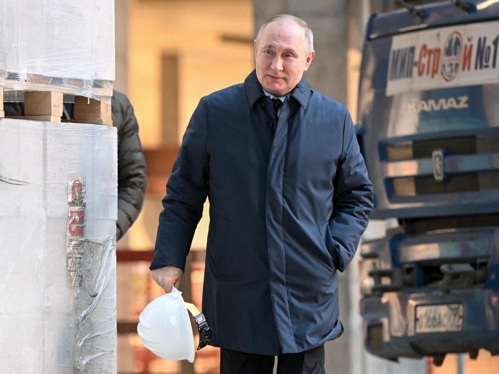 Russian President Vladimir Putin visits the construction site of the National Space Agency in Moscow