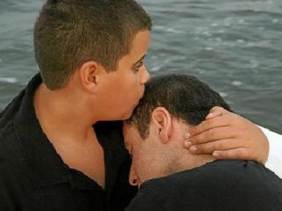 Jett Travolta, con su padre, en una foto reciente