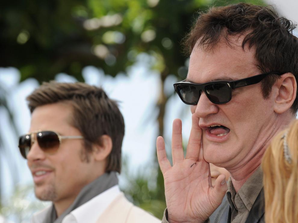 Brad Pitt (d) junto a Tarantino (d) en Cannes