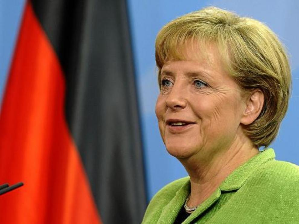 Merkel no ocultó su alegría el jueves al anunciar el visto bueno de GM a la oferta de Magna.