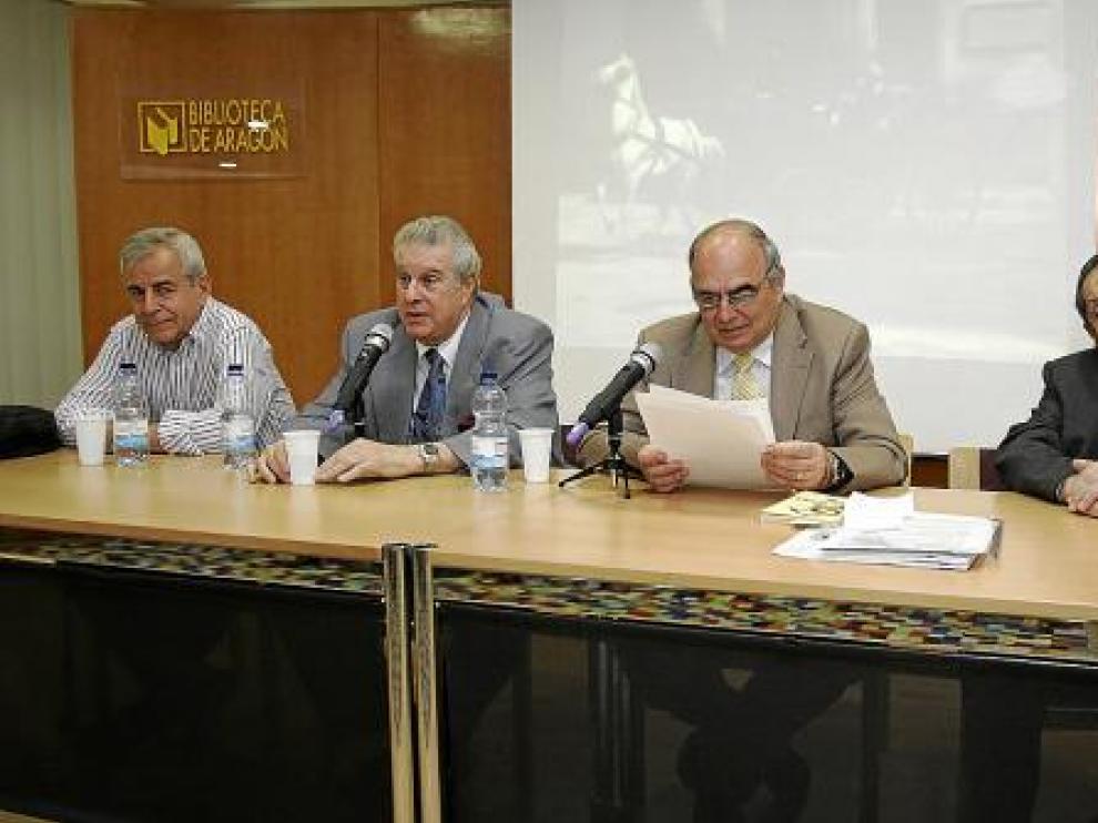 Dionisio Gracia, Emilio Belaval, Miguel Ángel Santolaria y José Til, durante el acto de ayer.