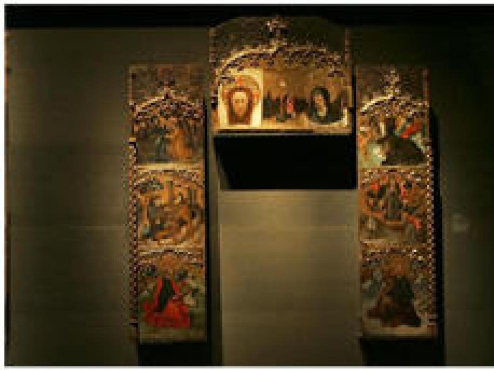 Retrablo de San Antonio Abad y caja sepulcral de Isabel de Aragón