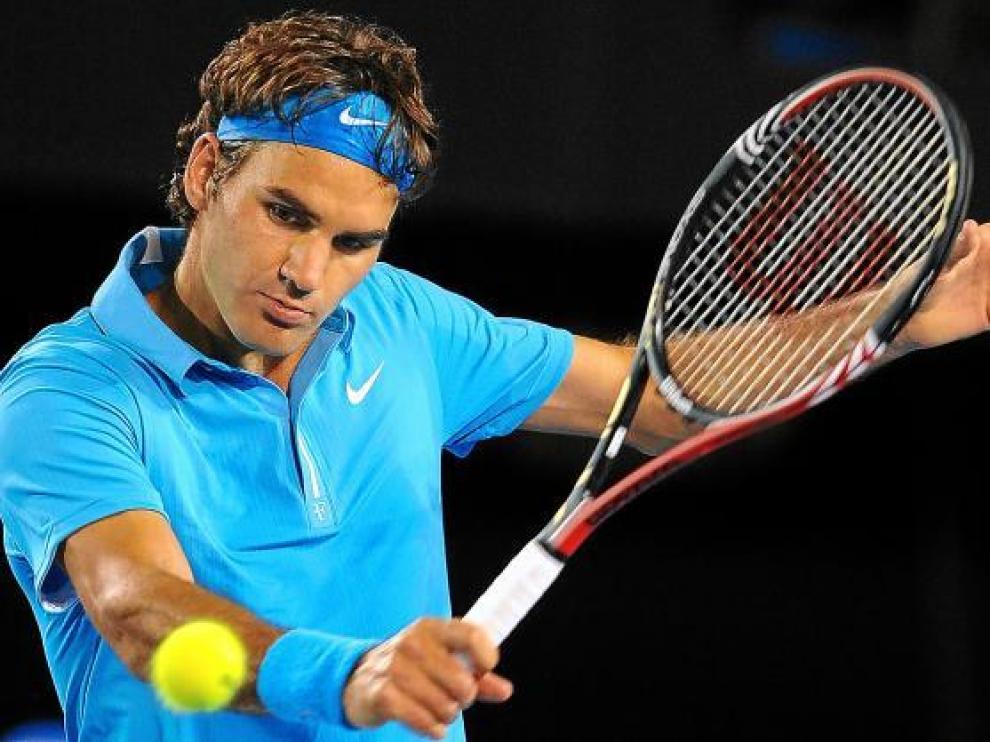 Roger Federer, en la imagen, aspira junto a Andy Murray a vencer el primer 'grande' de la temporada.