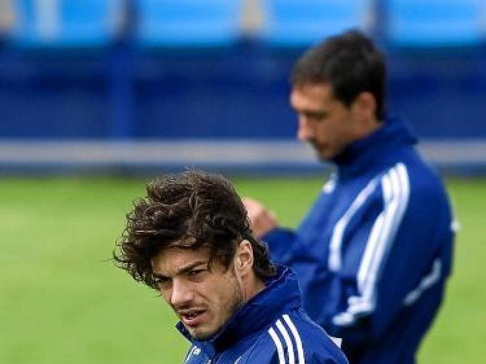 Contini, que hoy vuelve al equipo, ayer junto a Pablo Amo.