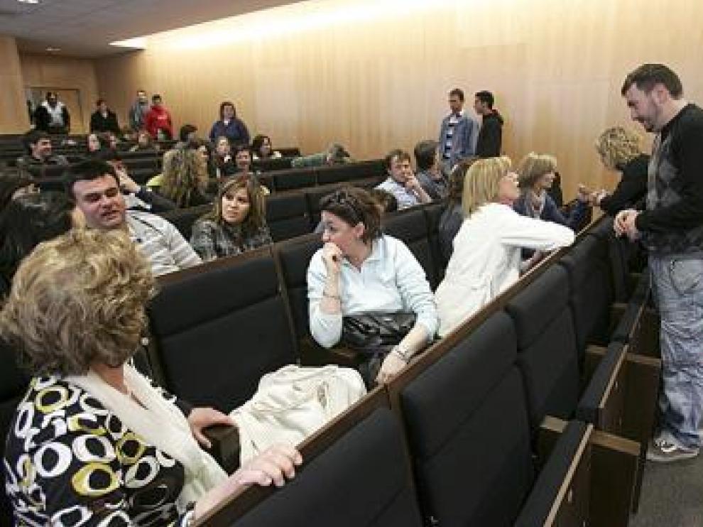 Asamblea de trabajadores del centro de digitalización.