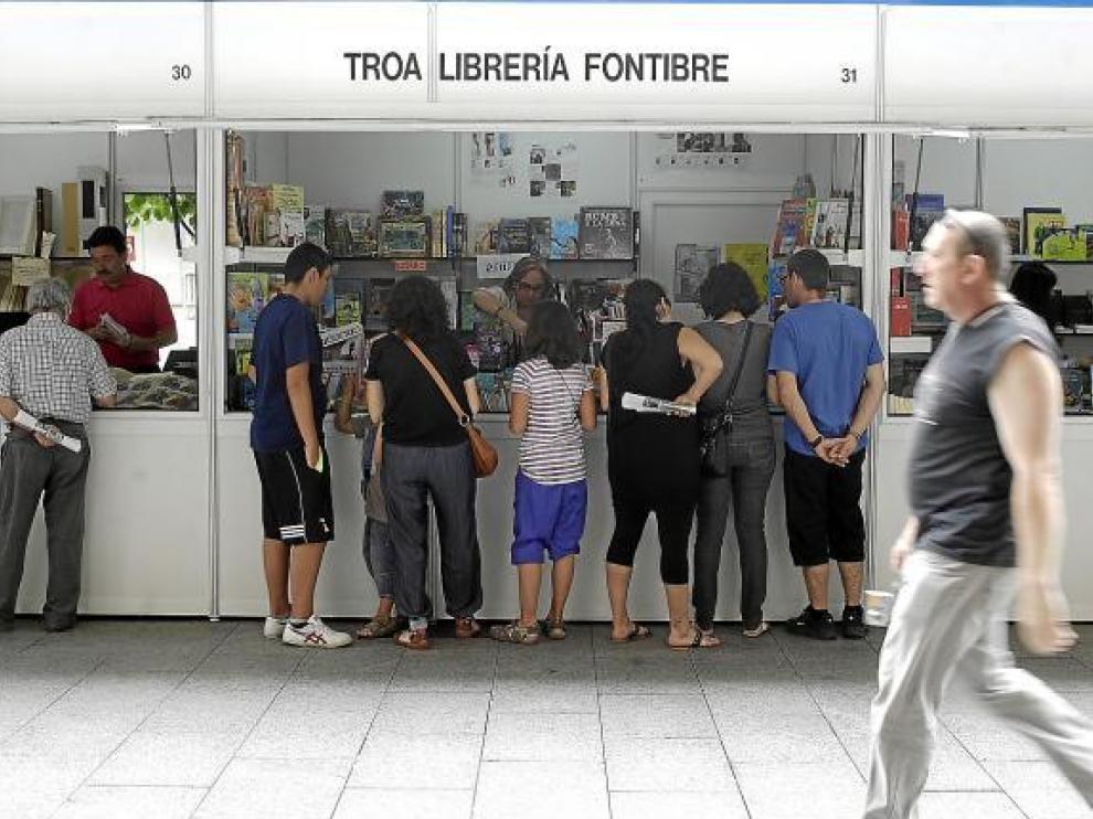 La afluencia de gente a las casetas se resintió por la coincidencia con el mercado medieval.
