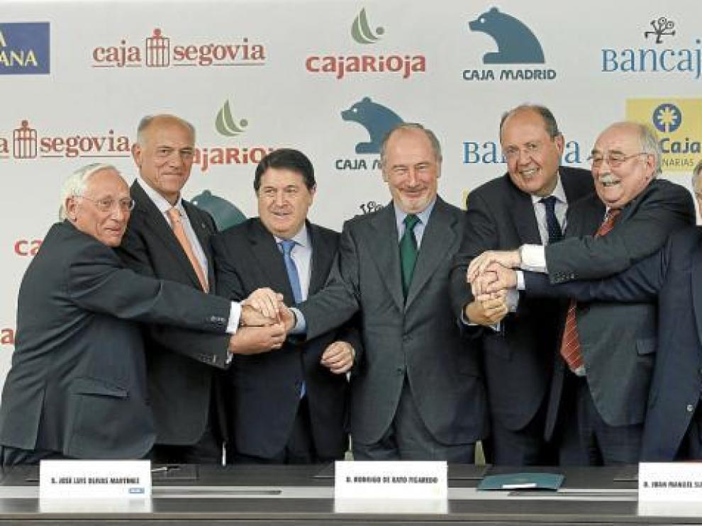 Fusión de Caja Segovia, Caja Ávila, Bancaja, Caja Madrid, Caja de Canarias, Caixa Layetana y Caja Rioja el día 15.