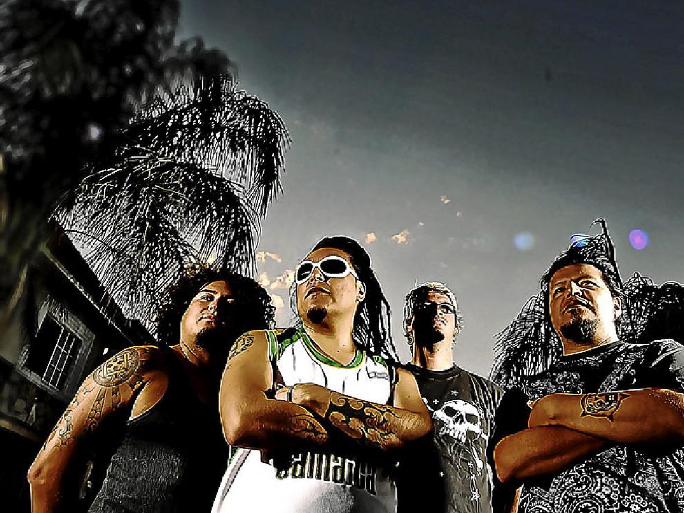 Cuatro de los integrantes del grupo mexicano El gran silencio