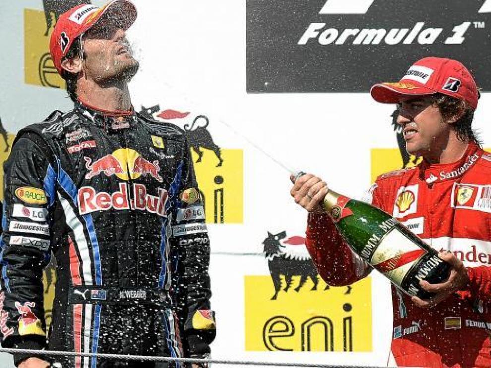 Fernando Alonso, en el podio junto a Webber.