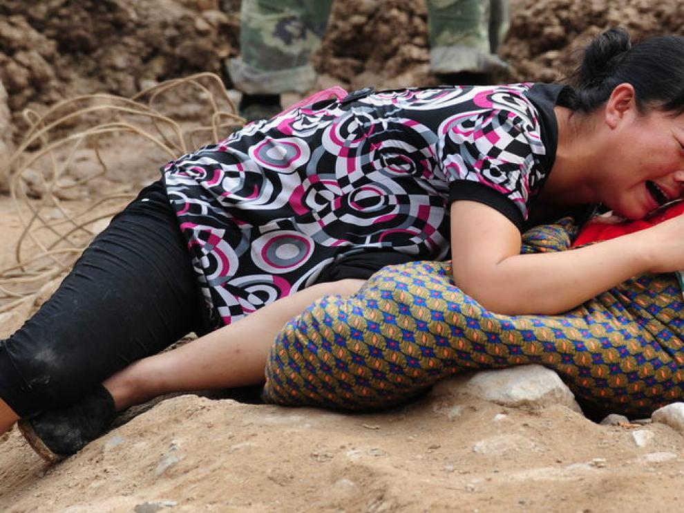 Dolor entre los afectados por el corrimiento de tierras