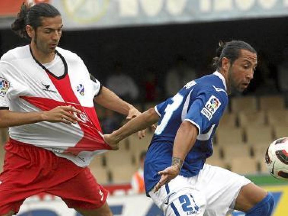 Juan Ochoa, agarrado por José Mari.
