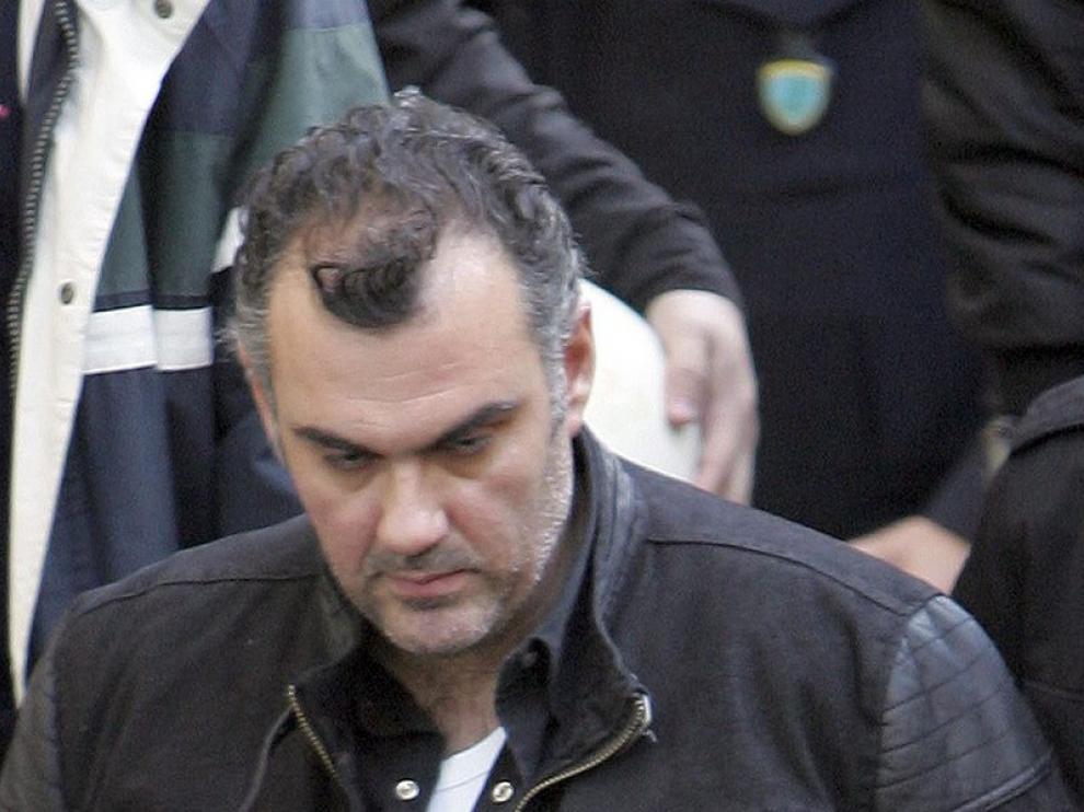 El policía detenido.