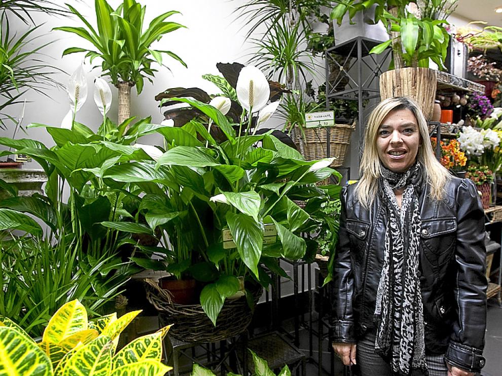 Ana García, florista: "Este año en la ofrenda muchos han ido sin ramo".
