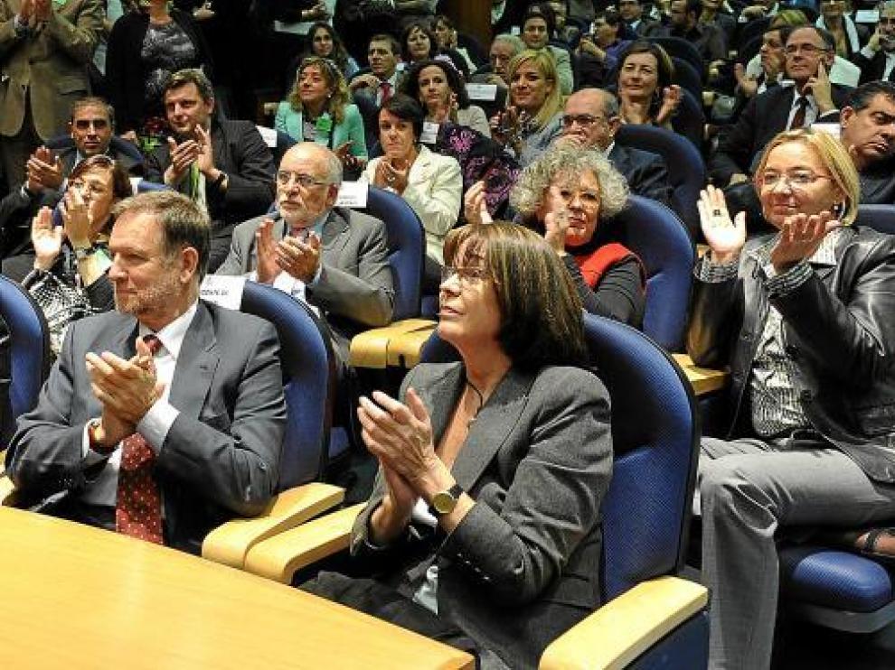 Iglesias, Morlán y Almunia, durante la toma de posesión de Leire Pajín.