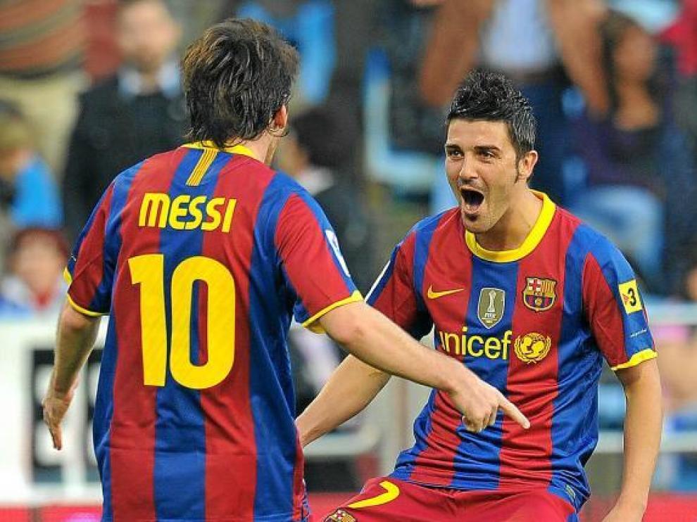 Messi celebra con Villa uno de los dos goles que marcó el pasado sábado en La Romareda.
