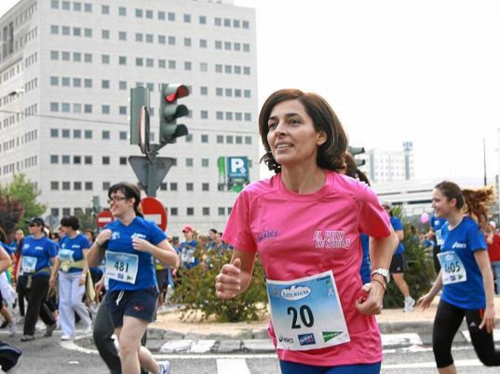 Carmen, la mujer que ha conseguido reunir a más de 50.000 corredoras, en una de las pruebas.