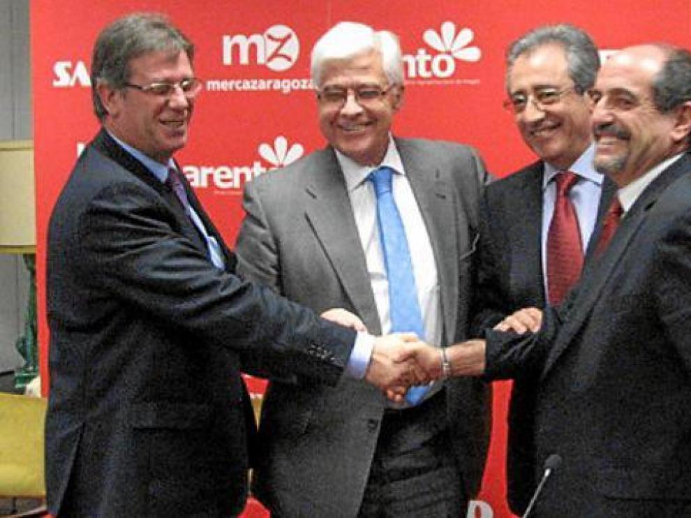 De izda. a dcha., Pedro Naudín, Gonzalo Arguilé, Constancio Ibáñez y Gilbert Infantes, tras sellar la alianza.