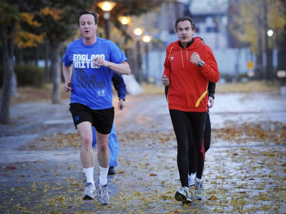 Zapatero y Cameron hacen 'footing' en Seúl