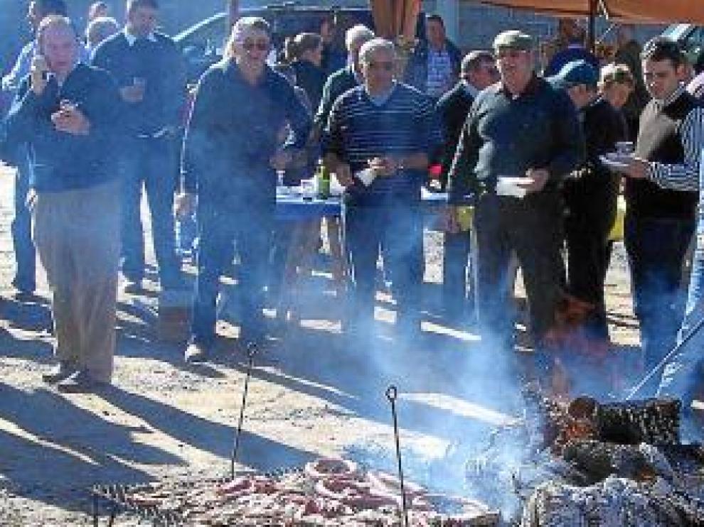 Hoguera de la Feria de San Martín para preparar la carne.
