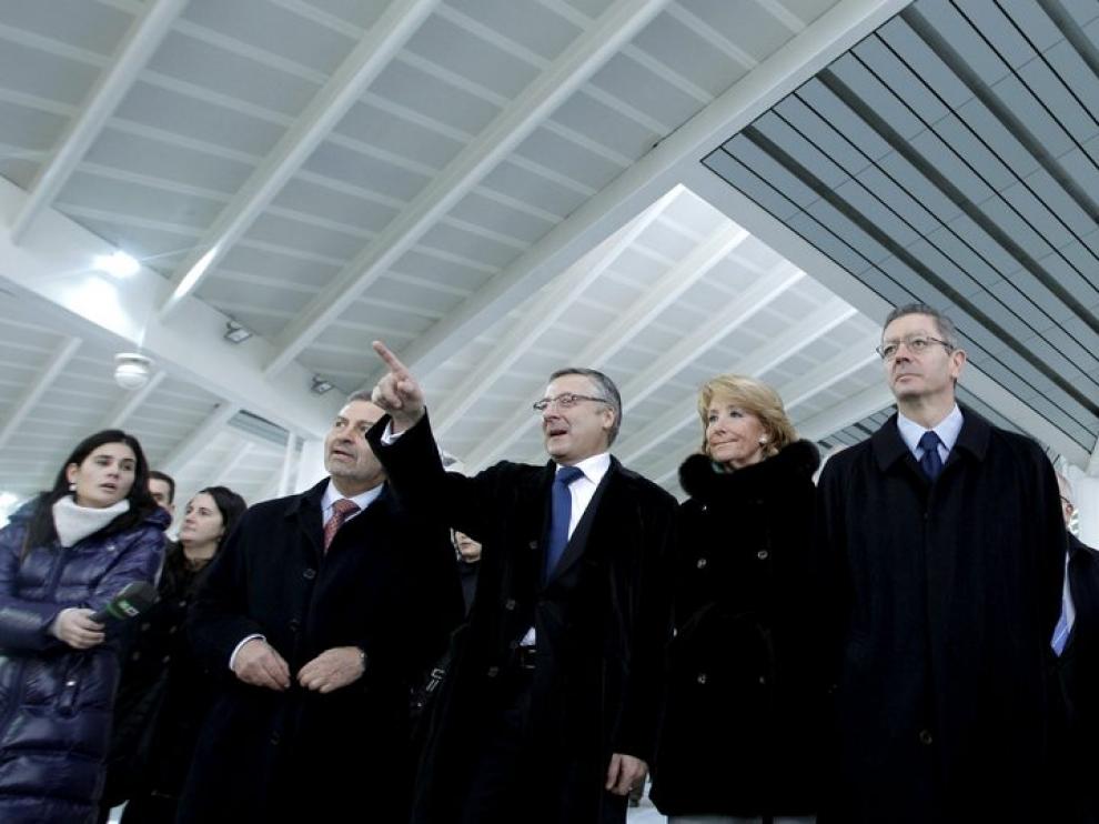 Blanco, Aguirre y Gallardón, en la inauguración en Atocha