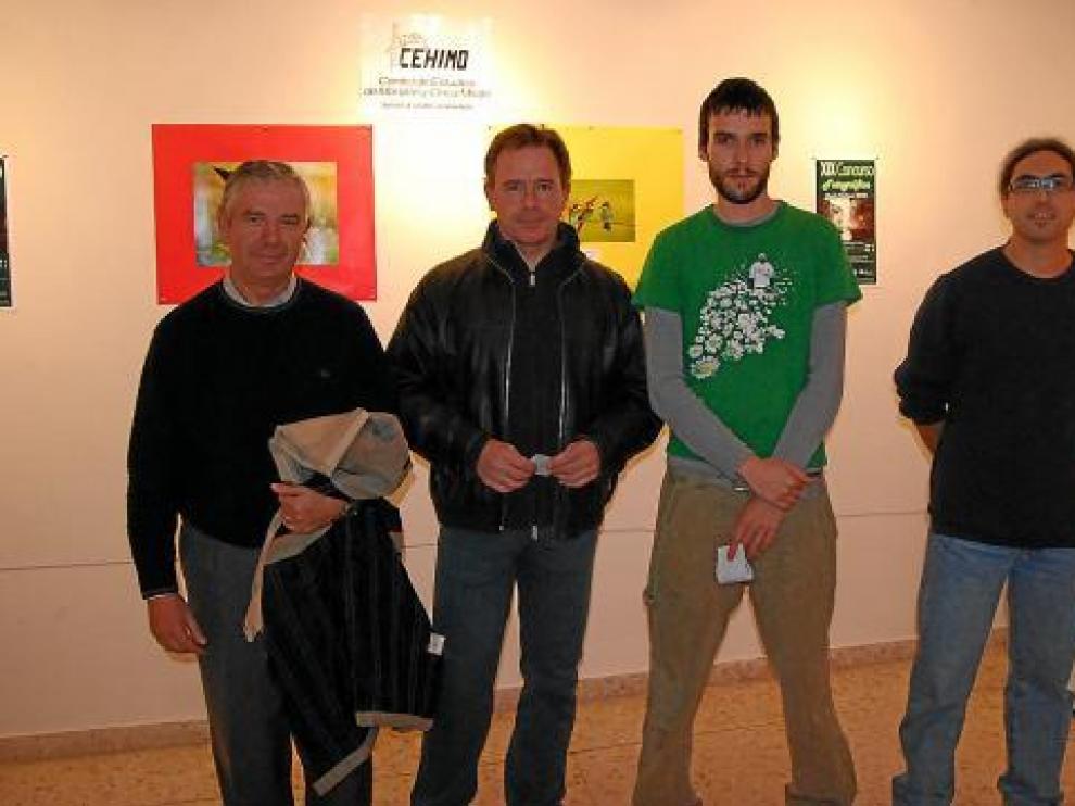 El presidente de Cehimo, Joaquín Sanz, con los premiados Lavedán y García, y Mario Garcés (jurado).