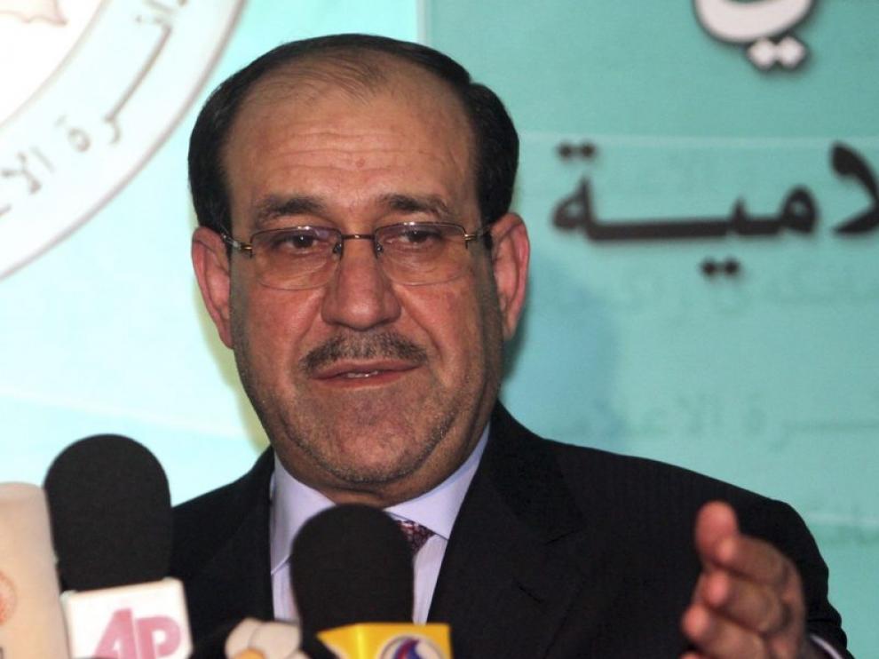 El primer ministro en funciones, Nuri al Maliki, atiende a la prensa, ayer en Bagdad