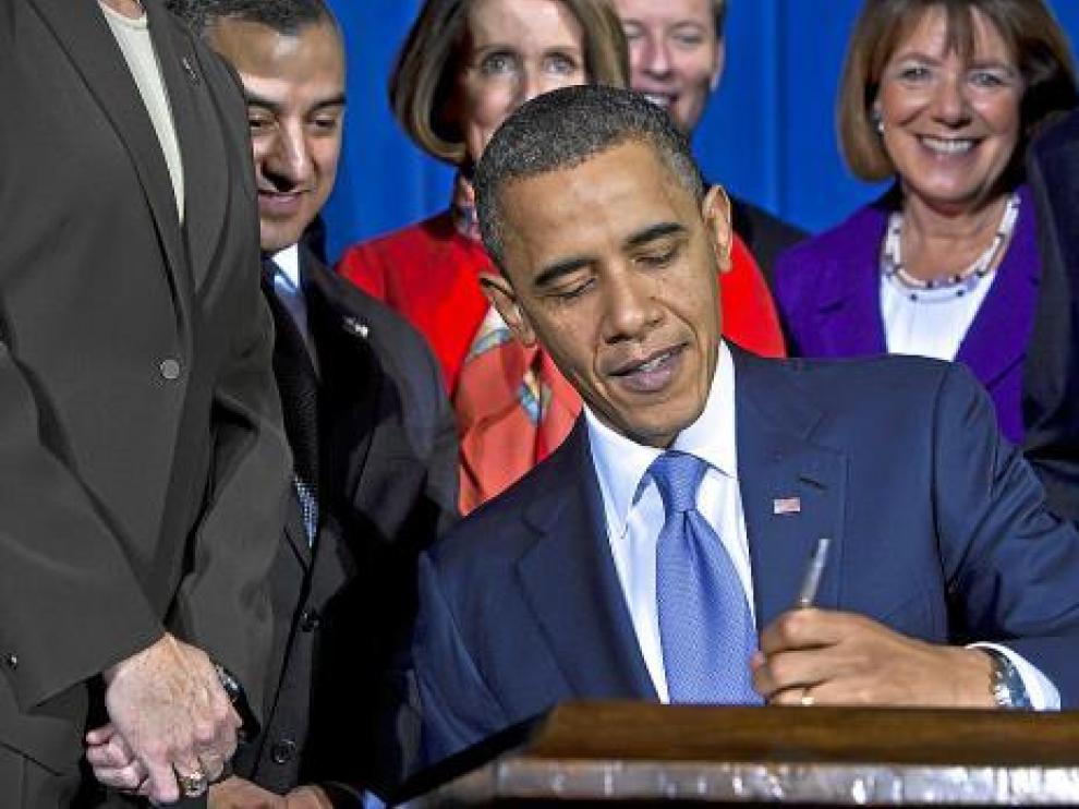 Obama firma la abolición de la ley 'Don't Ask, Don't Tell' (No preguntes, no digas), ayer.