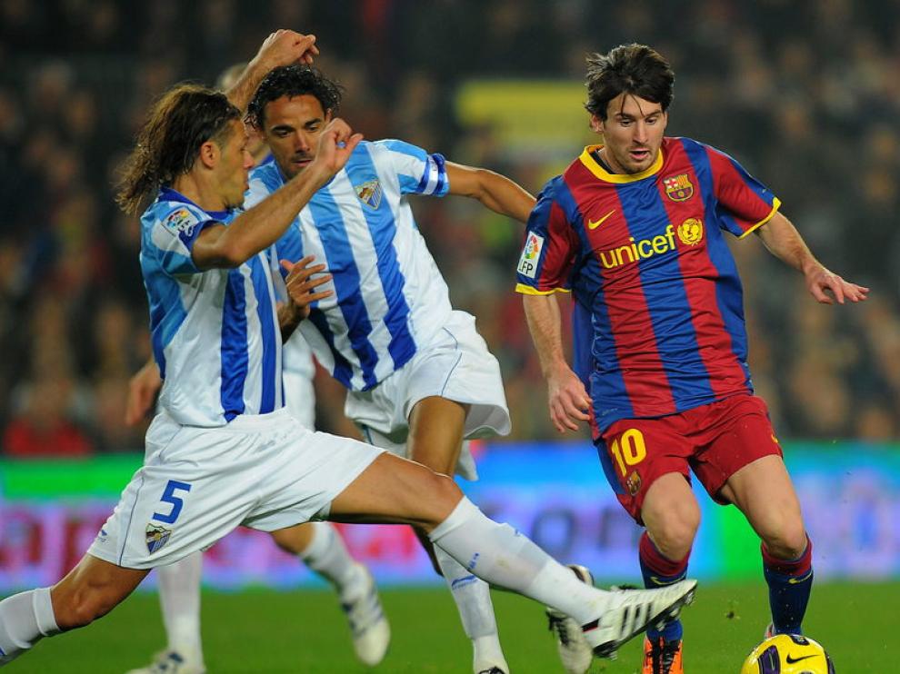 Messi se marcha de Demichelis en el encuentro ante el Málaga, el domingo pasado