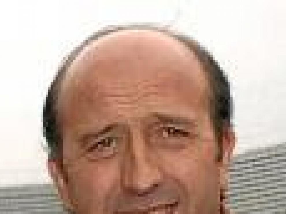 Miguel A. Lotina.