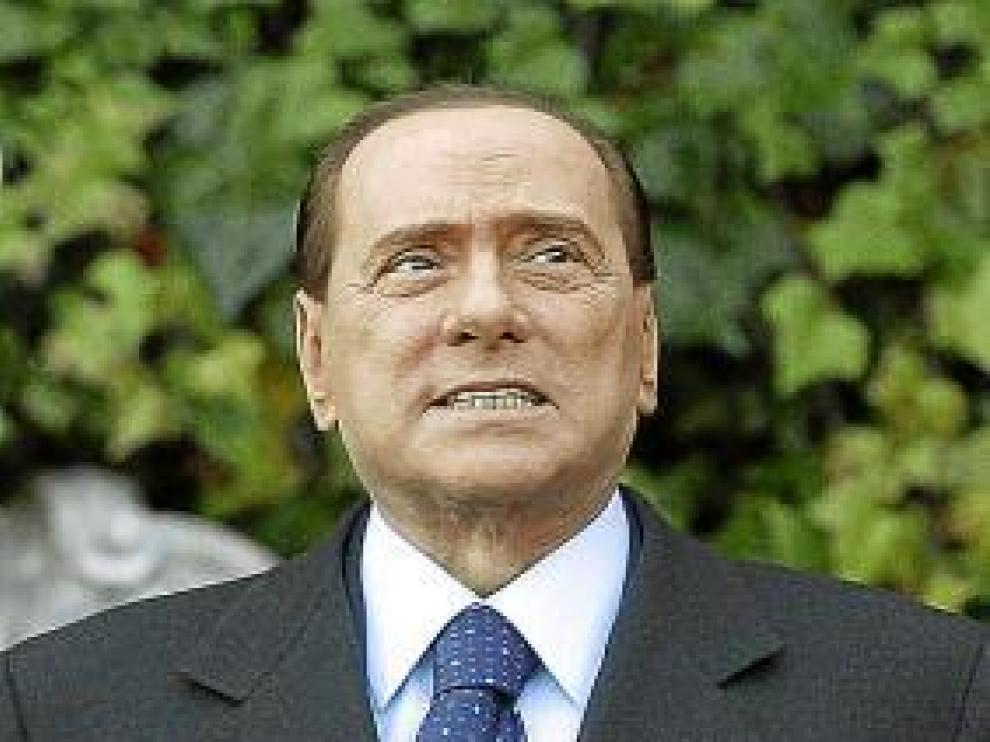 Fotos de archivo del primer ministro italiano y de la joven Ruby.