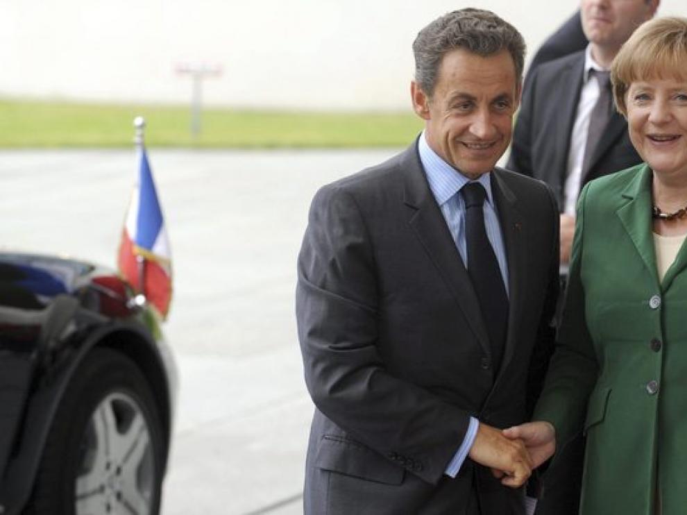 El persidente francés y la canciller alemana en una reunión bilateral por los preparativos de la cumbre de la Eurozona